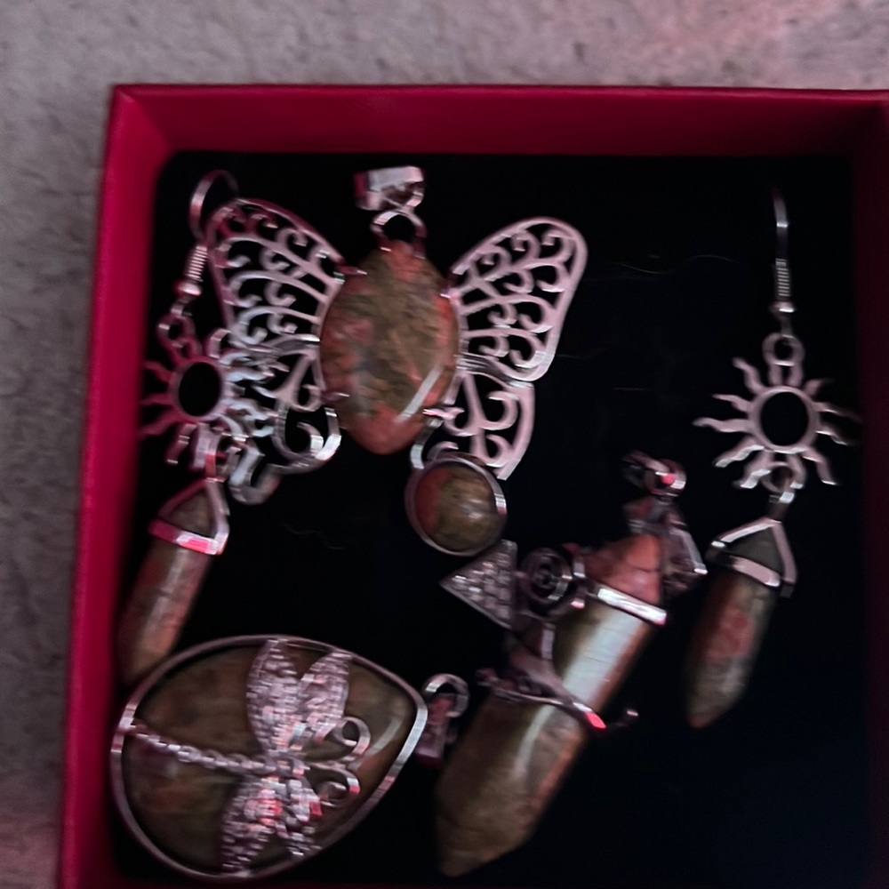 Unakite crystals, never worn. Ring is adjustable, earrings & several pendants.